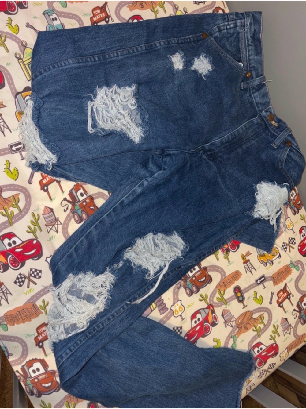Distressed Dark Blue Women’s Ripped Jeans